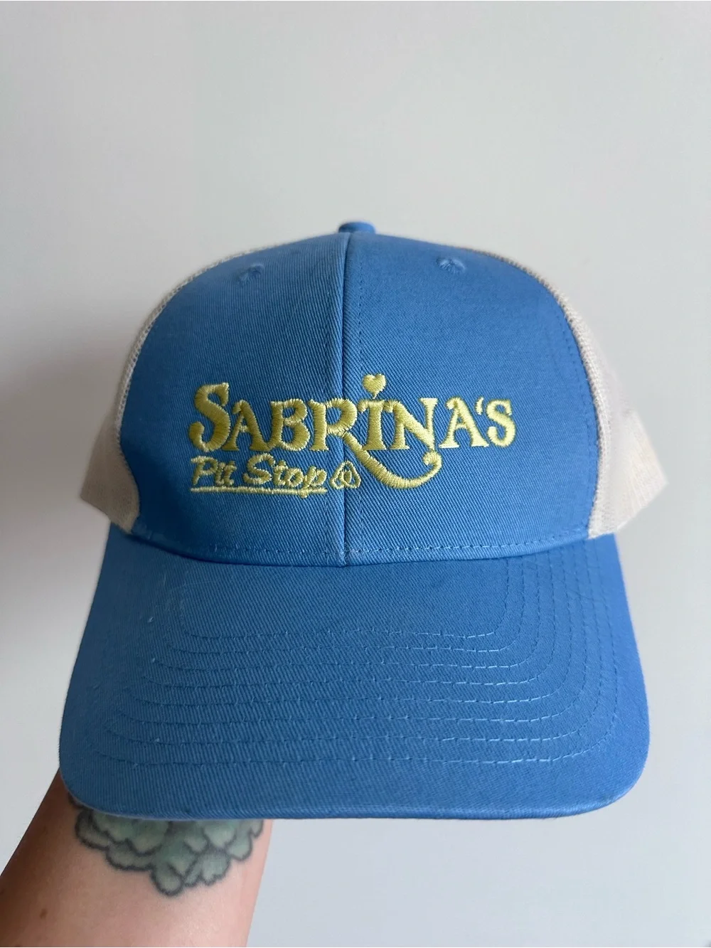 Sabrina's Pit Stop Blue and Cream Trucker Hat